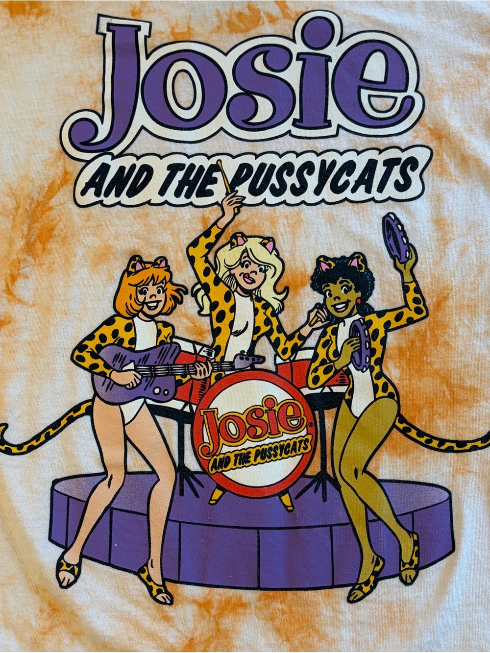 Josie and the Pussycats orange tie dyed graphic tee